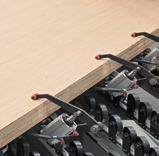 Panel clamping devices avoid the misalignment of the stack during