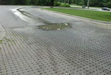 Localized patched of standing water on <25% of facility surface or water present in standpipe 72hrs after rainfall event. Vacuum with regenerative air sweeper.