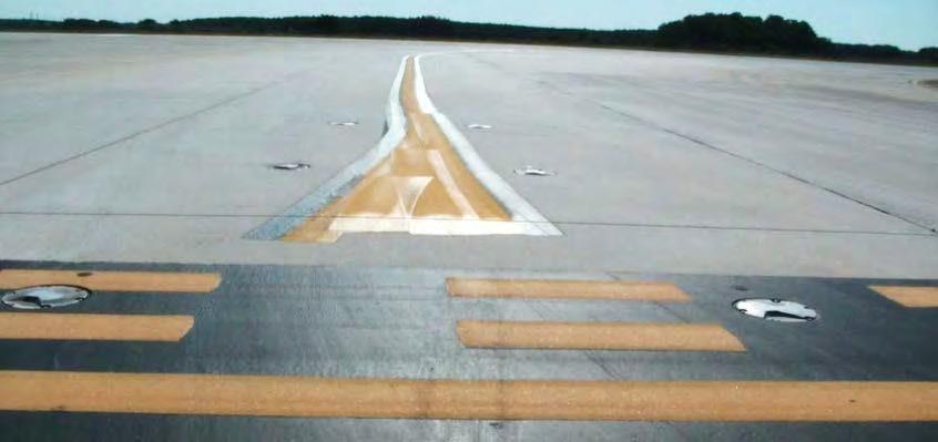 Airfield Markings The taxiway centerline beyond this runway holding position marking is painted very sloppy and