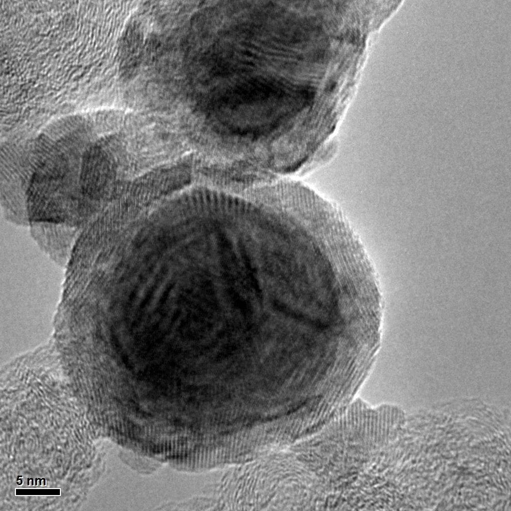 TEM image of the Core-shell structure made by Sequential Impregnation Image on the left shows a larger particle with diameter around 35nm.
