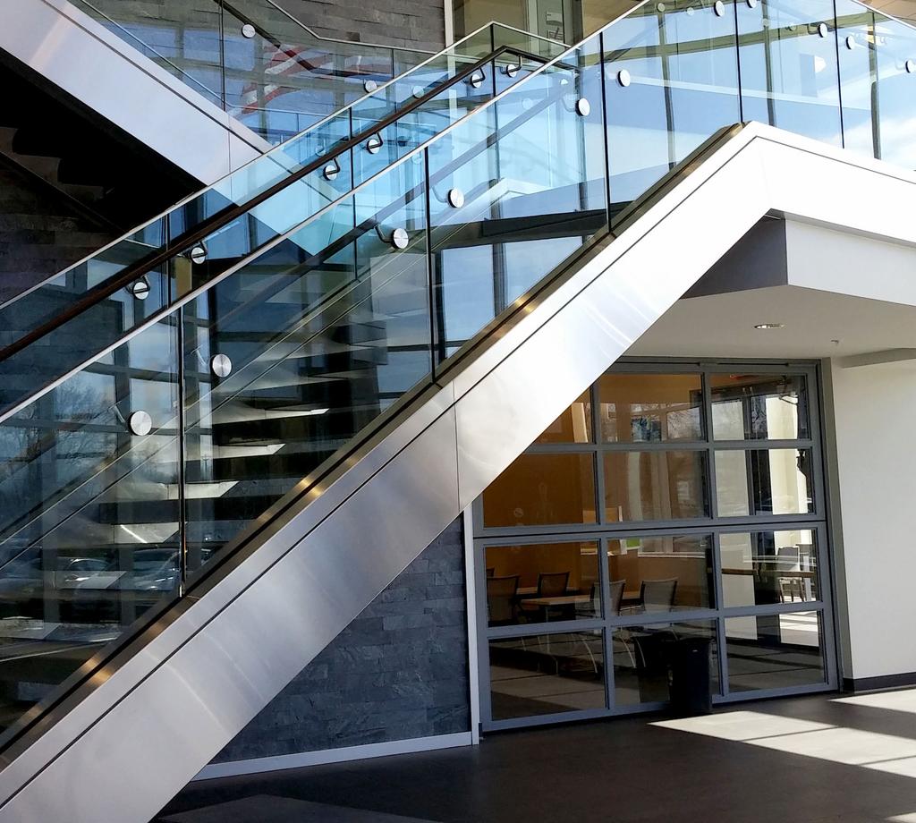TRACK RAIL Base Shoe Railing System The Track Rail base shoe glass railing system is designed and constructed using laminated or fully tempered glass.