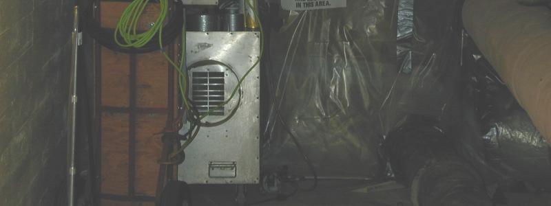 The ventilation system that must operate from the time of initial asbestos disturbance until the containment passes final air clearance testing. 1.