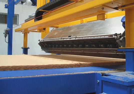 In the production of fiberboard/chipboard, it is generally imperative to apply release agents to the fiber mat and conveyor belt.