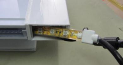 connector to the LED strip from the side conduit (Figure B).