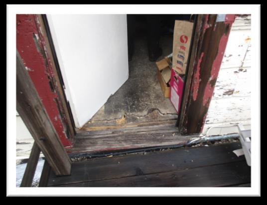 5) Section I $1,200.00 Dryrot is found at the attic flat rear porch flooring around the door threshold area. Recommendation: Repair the local area with similar material. Install a new threshold.