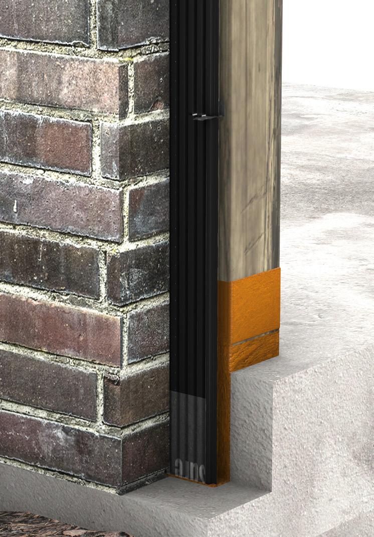 Install the Sure Cavity rainscreen between the brick wall and the studs with the fabric facing you as you install it.