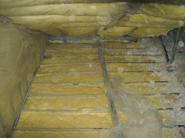 Inspection of the insulation in the attic spaces directly above rooms A215, B211, D215 and E211 revealed the following condition: 3.