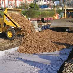 An extensive, full-scale, independent research programme was carried out by British Rail and this clearly showed that the use of a geogrid beneath ballast over a soft sub-grade: Helps to