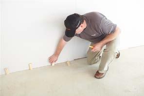 Installation Steps: Step 1: In the selected starting corner, place ½ spacers at each side of the starting