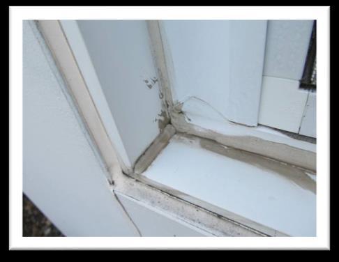 Poor caulk joint at a window joint - Adhesively