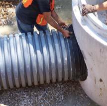 When connecting dual wall corrugated SaniTite HP pipe to a manhole, a smooth exterior surface on the pipe is typically required.