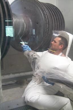 operator works in ventilated suit inside a ventilated room to remove CO 2 and contamination