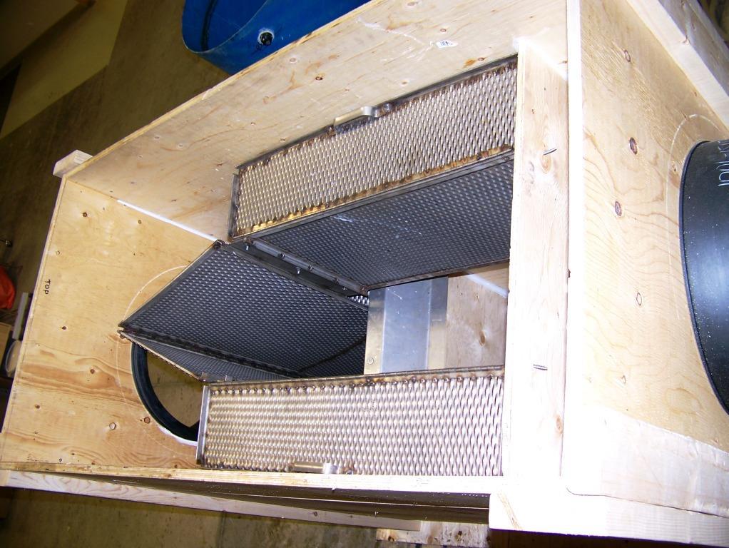 2.1 Test Setup Figure 6 Debris Separating Baffle Box in Plywood Vault The design specifications of the DSDB are provided in Table 1. The test unit had a total sedimentation area of 12.