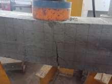four beams were casted, all beams tested under point load by using loading machine.