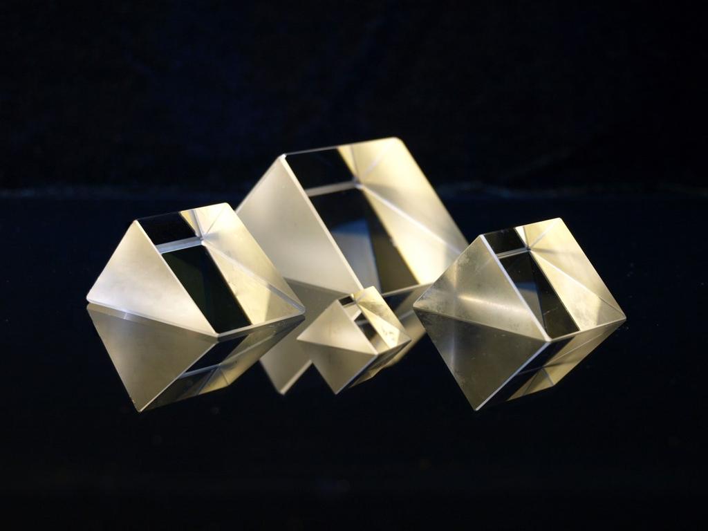 Right Angle Prisms Product : RAP Standard Right Angle Prisms (RAP) are uncoated. Non-standard prisms are also available, but require a quotation for price and delivery.