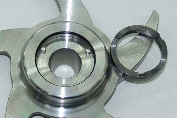 3. Remove rotating seal (30) ring from the impeller backside Rotating seal