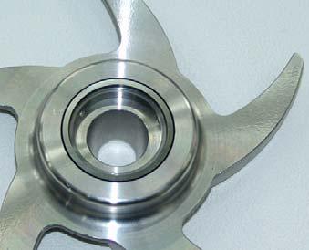 Install rotating seal parts inside back of impeller.